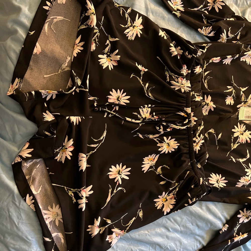 Black romper with flowers shorts